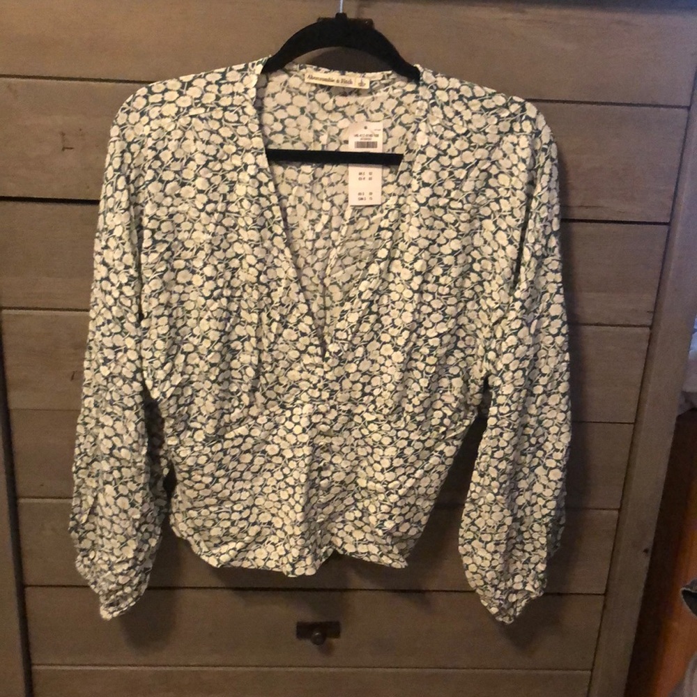 Green floral blouse with button detail